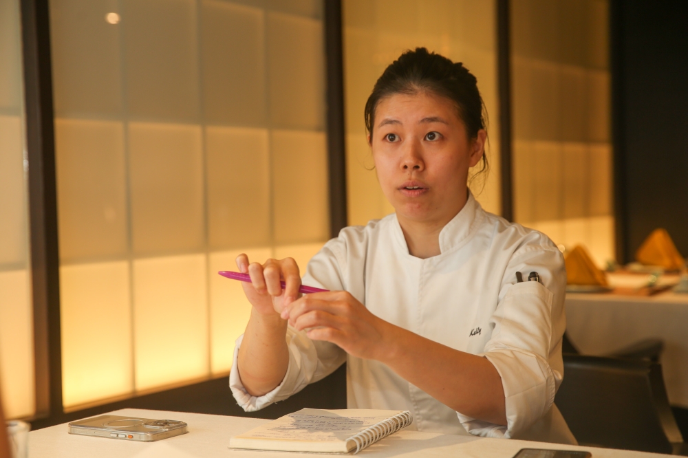277510 Chan, 32, was the first of the two to work at Robuchon au Dôme in Macau. — Picture by Choo Choy May