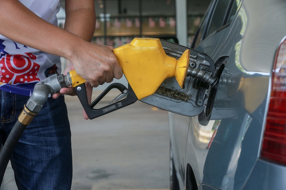 Linking fuel purchases to personal IDs means vast amounts of sensitive information will be collected. — Picture by Sayuti Zainudin
