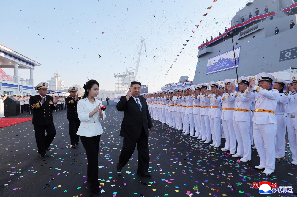278240 North Korean leader Kim Jong Un, accompanied by his daughter Kim Ju Ae, attends a ceremony for the launch of a ‘new multipurpose destroyer,’ as per state media KCNA's reports, in Nampo, North Korea, in this handout picture released on April 26, 2025, by the Korean Central News Agency. A major accident happened at a launch ceremony for a new North Korean naval destroyer, state media reported today. — Korean Central News Agency handout pic via Reuters
