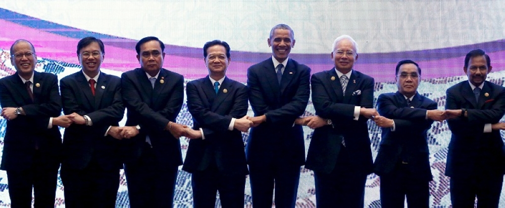 278776 Asean leaders gather for a family photo with US President Barack Obama (5th left) after a US-Asean meeting at the Asean Summit in Kuala Lumpur November 21, 2015. — Reuters pic