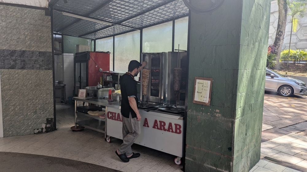 278901 The vertical spit for their chicken and beef ‘shawarma’ is located out front, near the entrance. — Picture by Ethan Lau