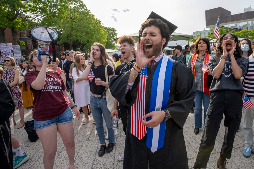 279598 Graduating Harvard student Victor Flores and others rally in support of international students during the Harvard Students for Freedom rally at the Harvard University campus in Boston, Massachusetts, on May 27, 2025. — AFP pic