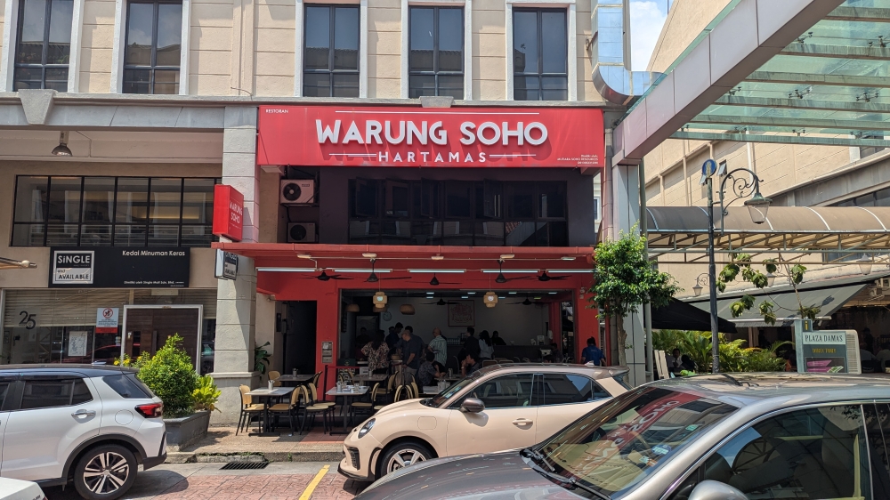 279699 Look for the red sign right as you approach Block D of Plaza Damas. — Picture by Ethan Lau