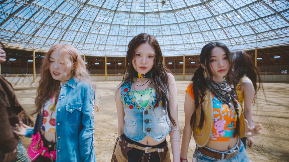 279871 Lingling (centre) wearing a denim vest and chaps in a rodeo arena for KIIRAS' video 'Kill Ma Bo$$' — Screengrab from YouTube/KIIRAS