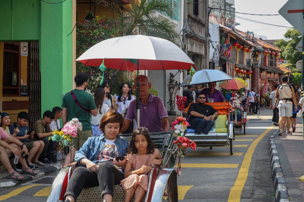 Armenian Street remains a popular attraction among tourists. — Bernama pic