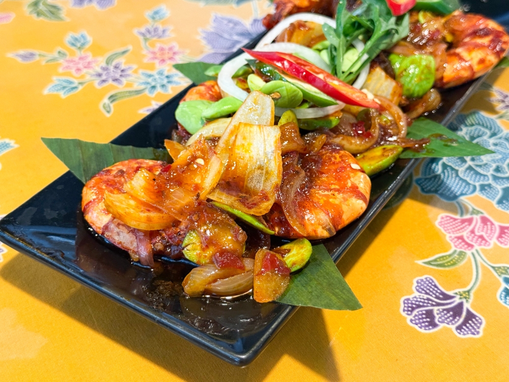 Sambal Tumis Merah Petai Menora Udang Harimau marries bouncy, fresh prawns with a mellow red 'chilli sambal' with 'petai'. — Picture by Lee Khang Yi