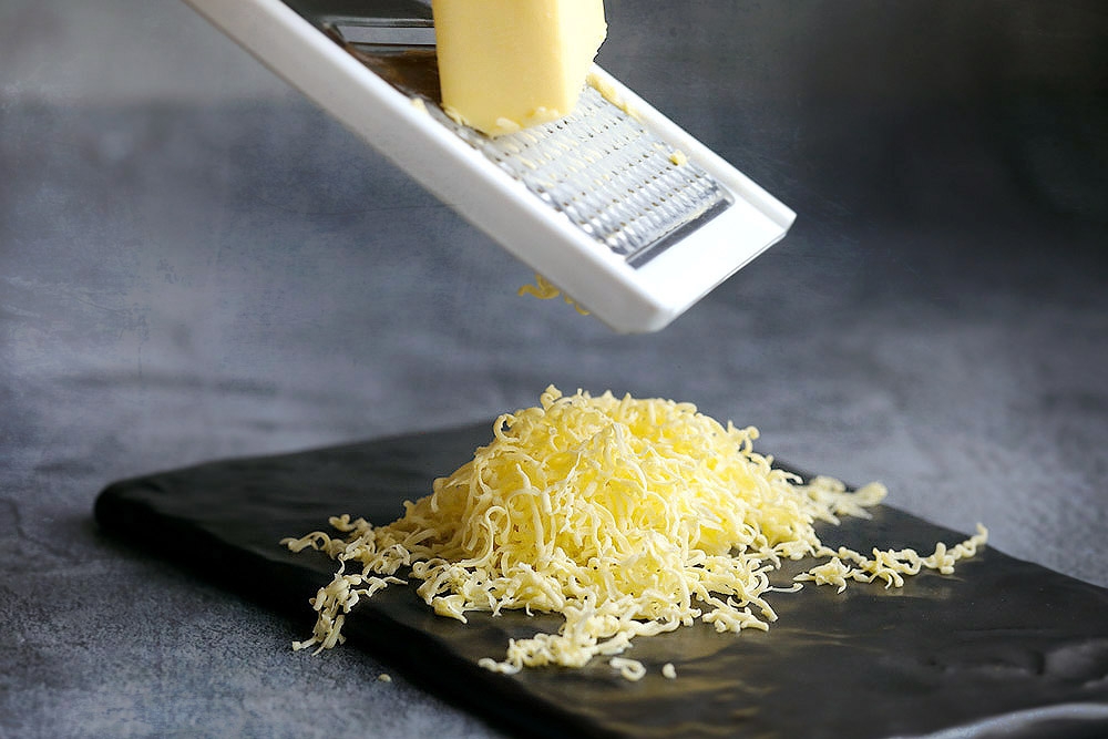 Grate the cold butter. — Picture by CK Lim