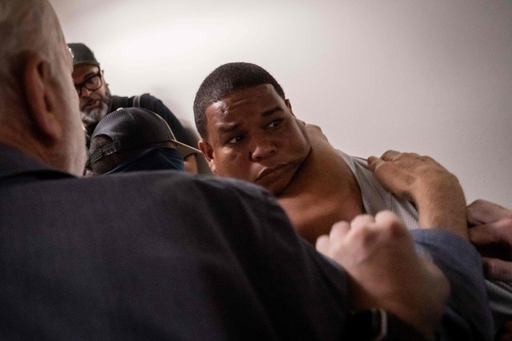 A Dominican man is detained by plainclothes officers with Immigration and Customs Enforcement (ICE) after his immigration court hearing at the Jacob K. Javitz Federal Building on June 6, 2025 in New York City. — AFP pic
