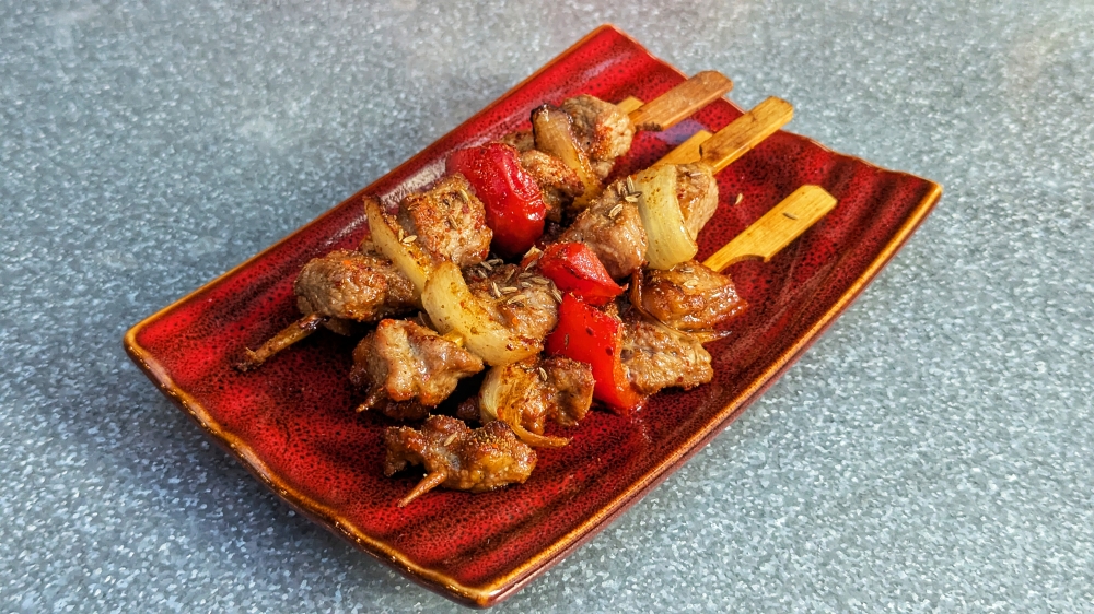 Spiced lamb skewers that aren’t groundbreaking, but satisfying. — Picture by Ethan Lau