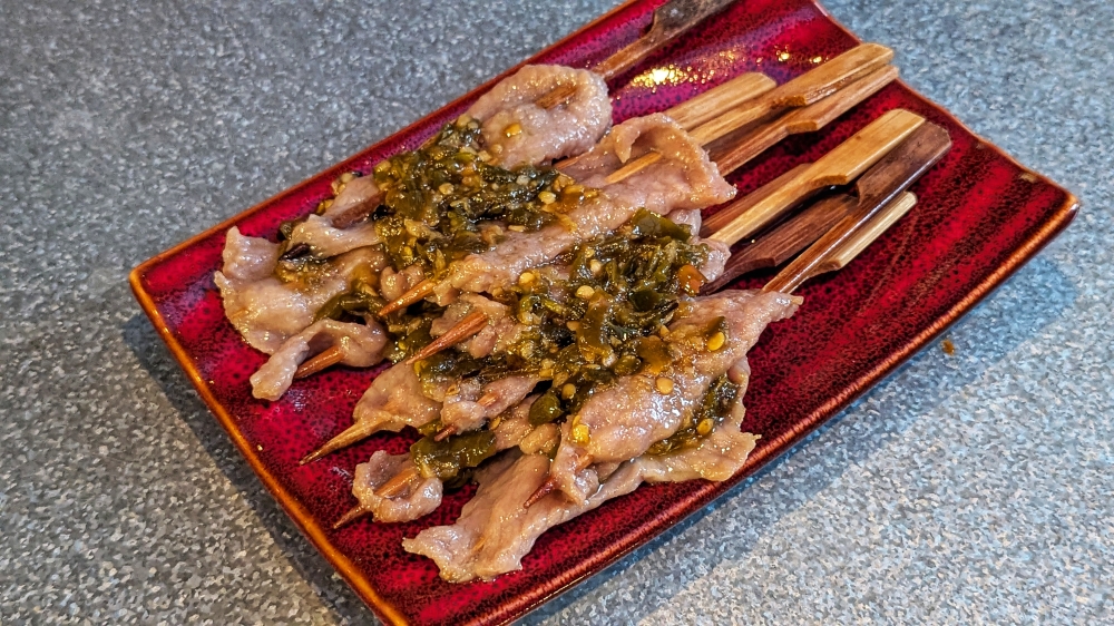 The brined beef skewers have a peculiar, slippery texture that’s rather enjoyable. — Picture by Ethan Lau