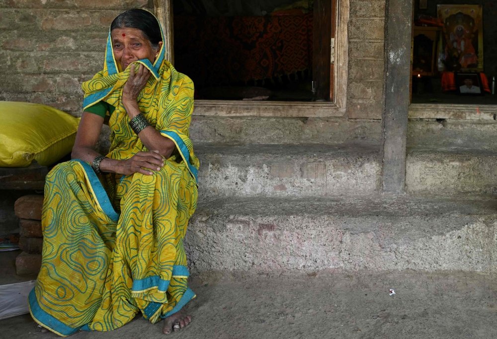 This photograph taken on May 3, 2025, shows Bhagabai Sanjivan Khindkar, whose son, Amol Sanjivan Khindkar — a farmer — died by suicide due to mounting financial debt. — AFP pic