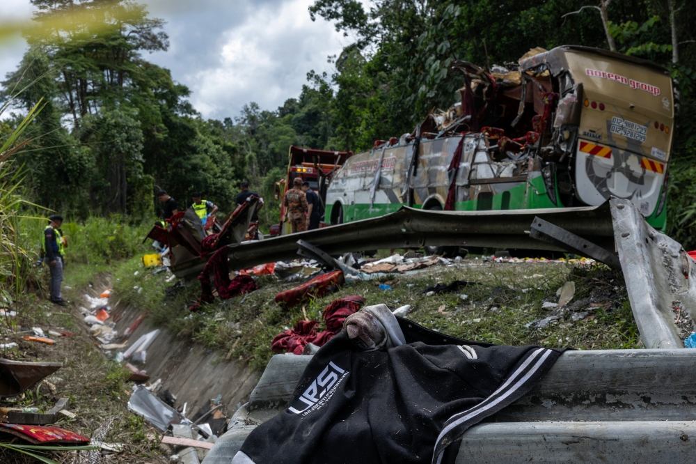The condition of the chartered bus at the scene of the crash on the East-West Highway near Gerik, Perak that killed 15 UPSI students aged between 21 and 23 who were returning to their main campus after the Aidiladha holidays on June 9, 2025. — Bernama
