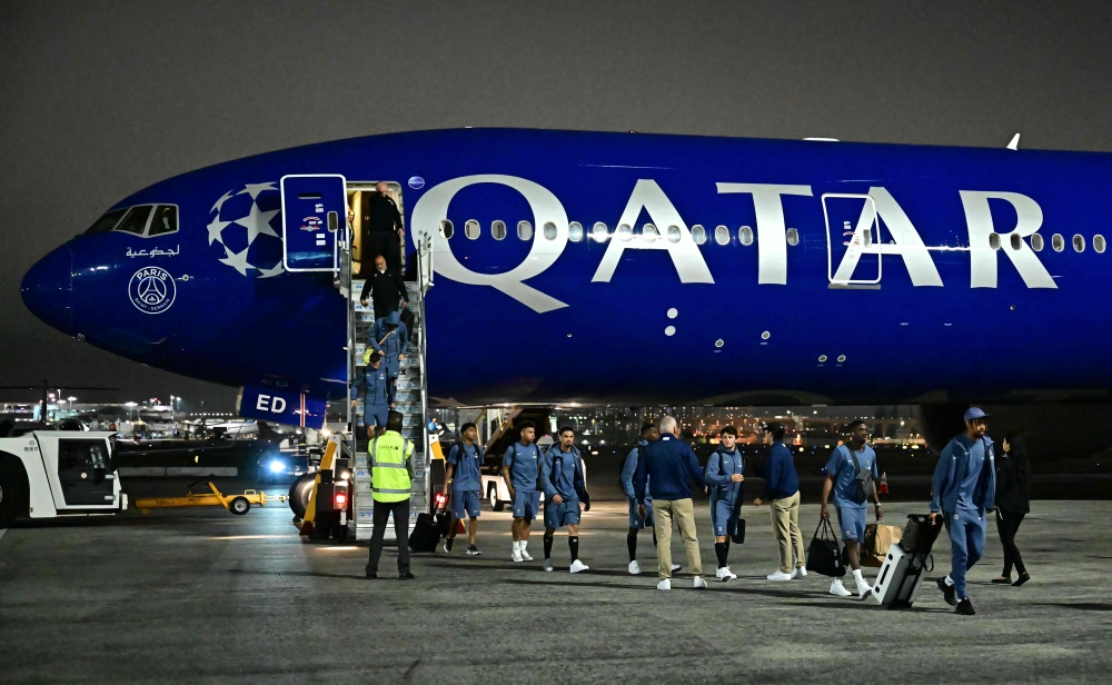 Paris Saint-Germain (PSG) players walk on the tarmac after landing at Los Angeles International Airport (LAX) on June 10, 2025 ahead of Fifa Club World Cup 2025. — AFP pic