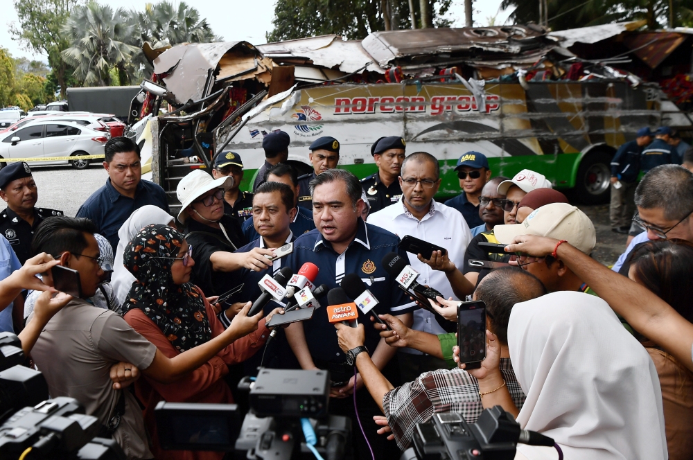 Anthony Loke speaking to the reporters after inspection on the ground. — Bernama pic