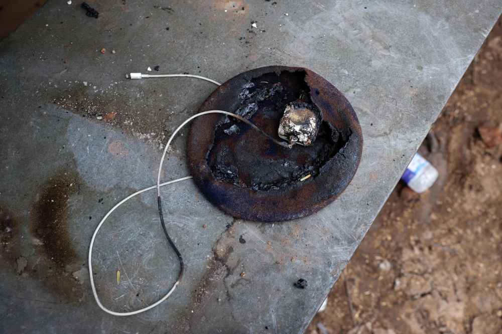 A burnt charger is seen at the crash site of Air India Boeing 787-8 Dreamliner plane, that crashed during take-off from an airport, in Ahmedabad, India, June 13, 2025. — Reuters pic
