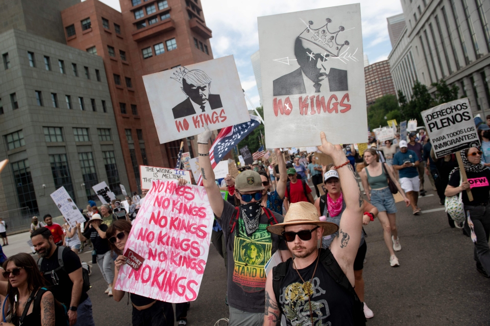Demonstrators protest the Trump administration during the ‘No Kings’ national rally in Denver June 14, 2025. — AFP pic