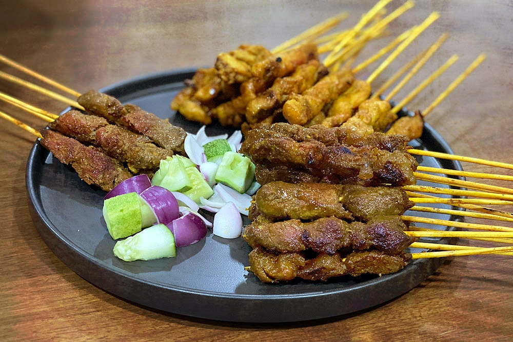 271212-1 Trio of satays (left to right): Beef, chicken and lamb. — Picture by CK Lim