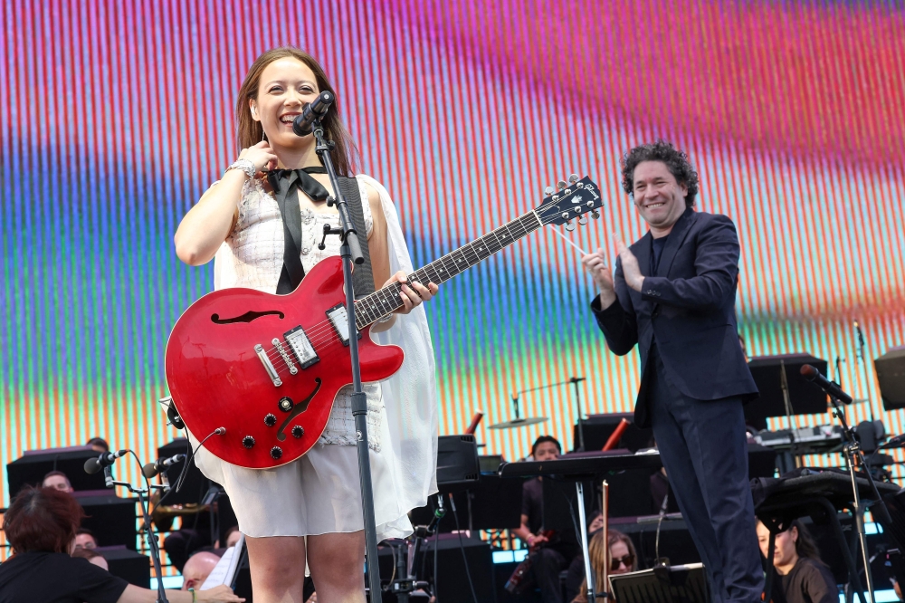 272005-2 Icelandic singer/songwriter Laufey performs on stage with Venezuelan conductor Gustavo Dudamel and the Los Angeles Philarmonic during the 2025 Coachella Valley Music and Arts Festival at Empire Polo Club on April 12, 2025 in Indio, California. — AFP pic
