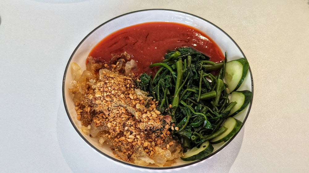 Jellyfish salad, a riff on Penang’s ‘sotong kangkung’. — Picture by Ethan Lau