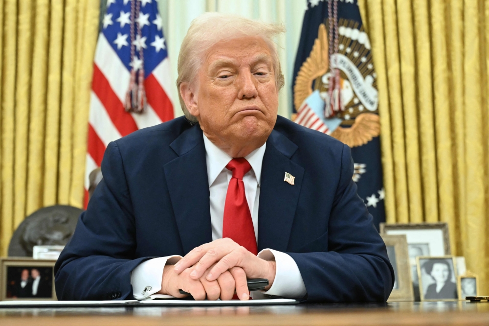 US President Donald Trump has pulled the United States out of an international deal on taxing multinationals and threatened tariffs on countries that target US tech giants. — AFP pic
