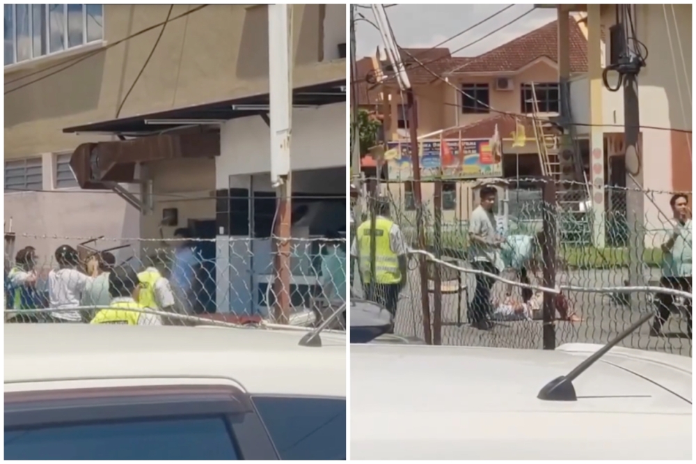 Screengrab of a video that went viral on social media showing a man brandishing a machete at several healthcare workers before a security guard at the scene discharged a shot using a shotgun.