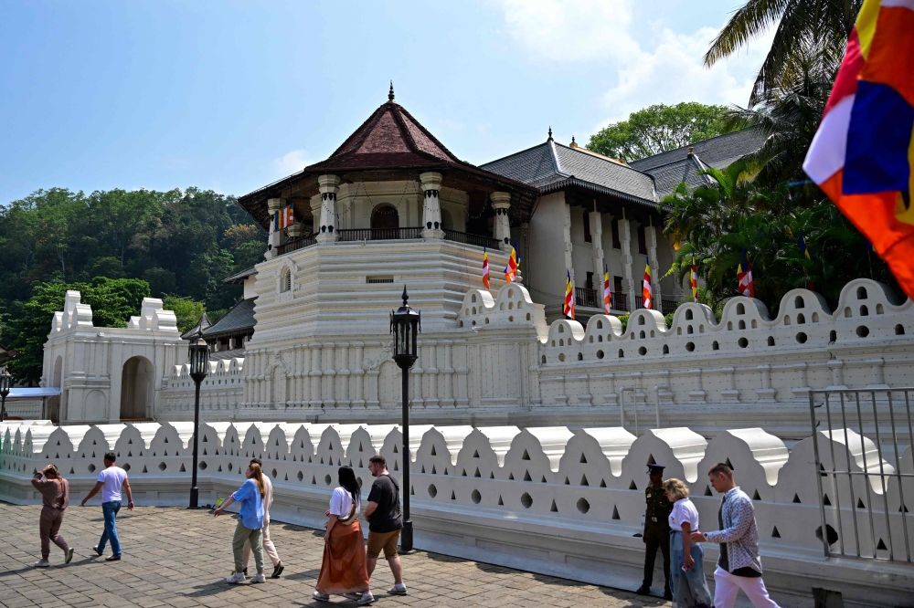 272404 A general view of the Temple of the Tooth in Kandy on April 18, 2025, ahead of a sacred exhibition of what Sri Lankans believe to be Buddha's left canine. — AFP pic