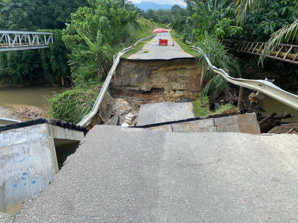 The bridge collapse has cut off access to Sungai Klah Hot Spring Park, Kampung Tisong, and the Buyong Mas Sanctuary Camp Site in Sungai Klah, Sungkai. — Picture via Facebook