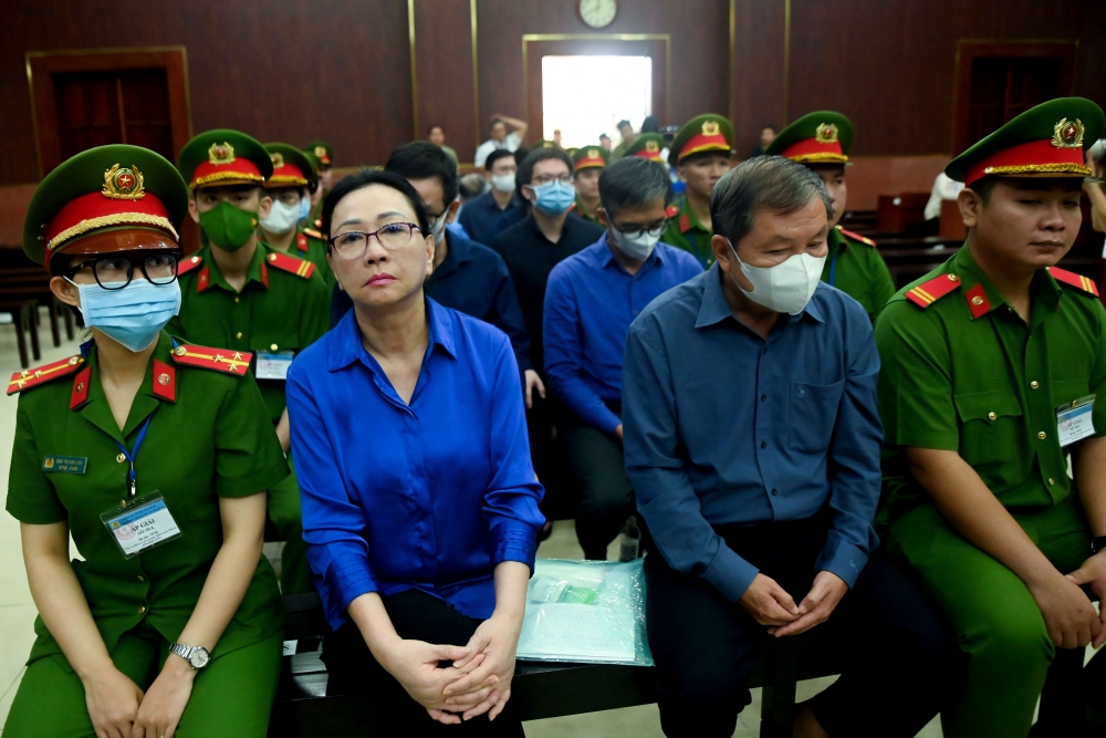 Vietnamese property tycoon Truong My Lan (2nd left) looks on at a court in Ho Chi Minh city on December 3, 2024. — AFP pic