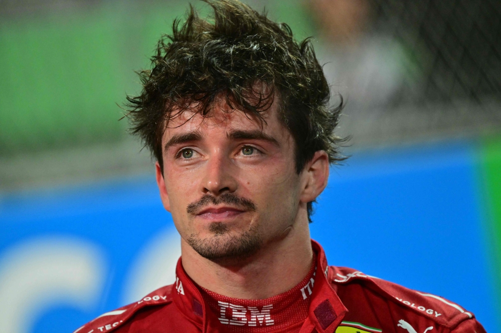 Third-placed Ferrari's Monegasque driver Charles Leclerc celebrates at parc ferme after the 2025 Saudi Arabia Formula One Grand Prix at the Jeddah Corniche Circuit on April 20, 2025. — AFP pic