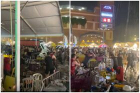Screengrab of a video showing a brawl in front of the 1 Utama shopping centre.