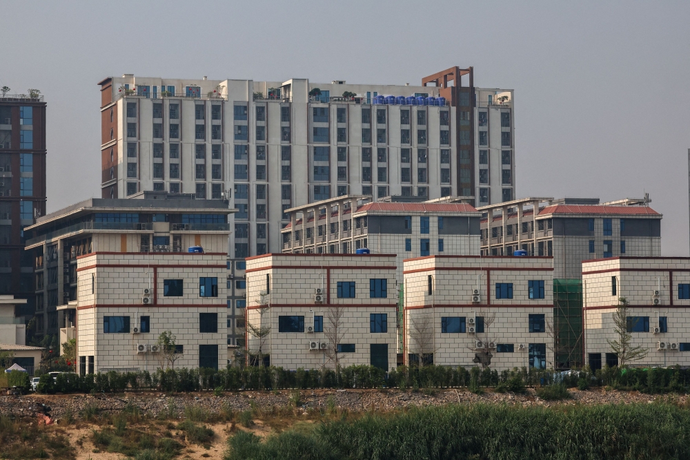 272554 A general view of Shwe Kokko city, a casino, entertainment, and tourism complex, from Thailand's side of the border, after Thailand said it would suspend electricity supply to some border areas with Myanmar in an effort to curb scam centres, amid growing pressure on the illegal compounds that have ensnared vast numbers of people of multiple nationalities, in Mae Sot district, Thailand February 5, 2025. — Reuters pic