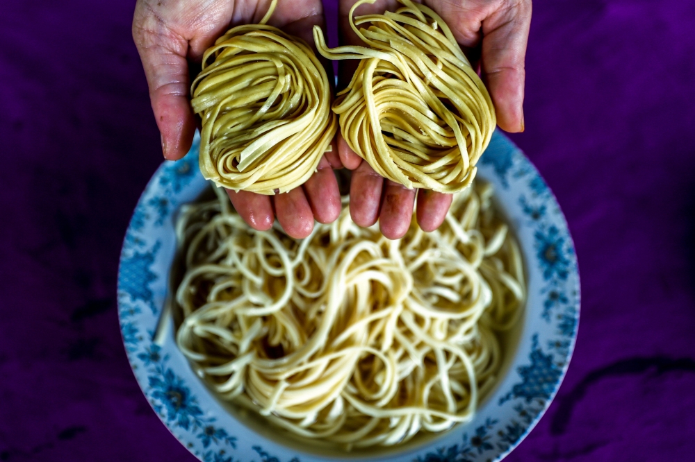 The bun noodles were specially ordered from Teluk Intan, blended using a traditional method that produces a chewy and smooth texture. — Bernama pic