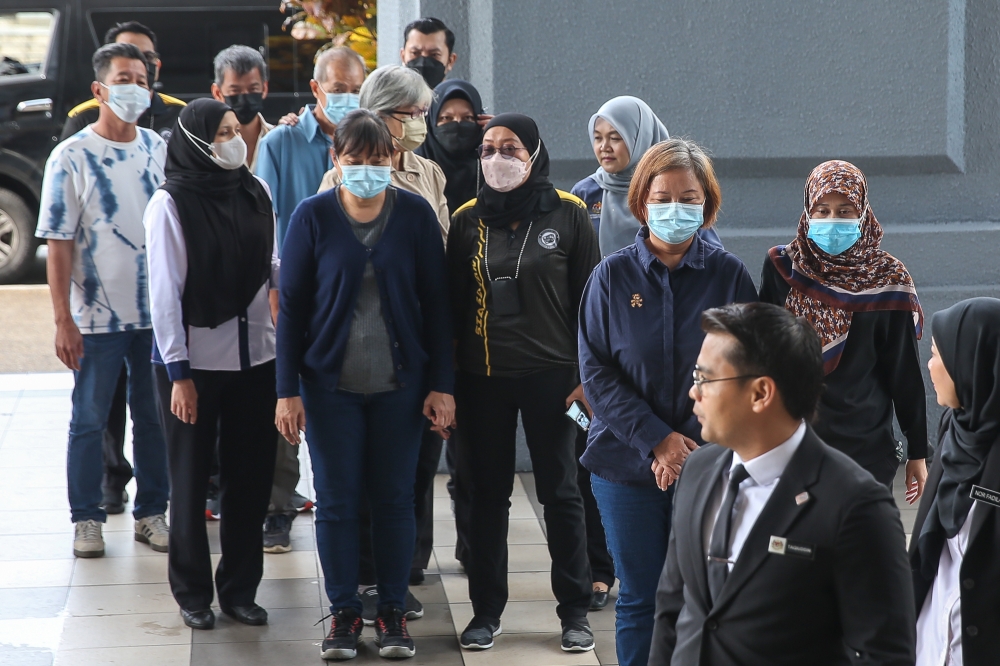 273007 The accused, totalling 15 people aged between 50 to 70, pleaded guilty before several magistrates at the Kuala Lumpur Court Complex this morning. — Picture by Yusof Mat Isa