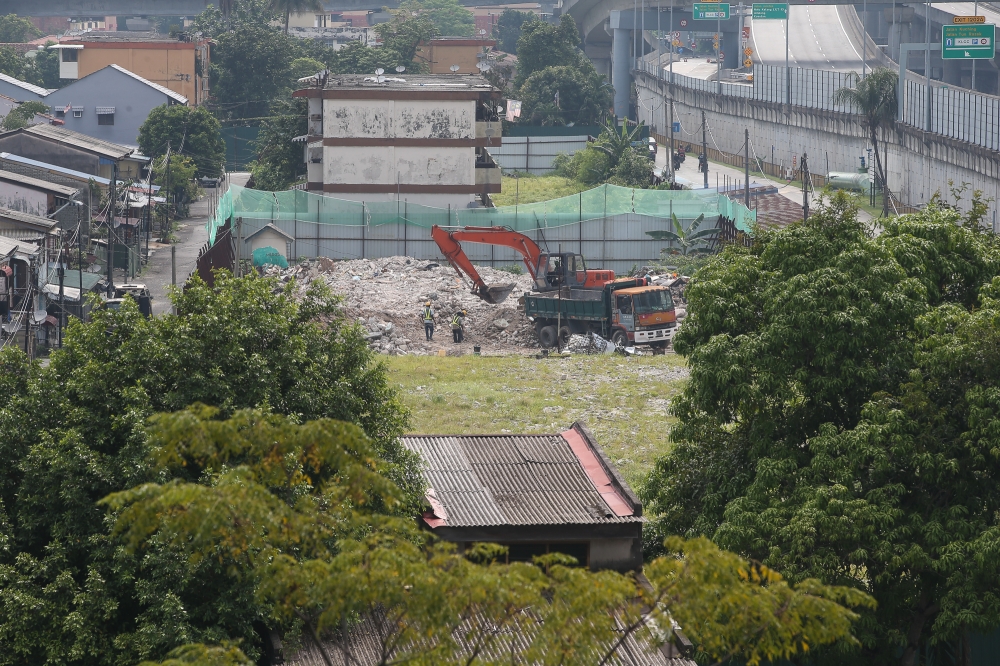 273505 Excavators are seen digging up the ground in Kampung Sungai Baru, Kuala Lumpur on April 26, 2025. — Picture by Yusof Mat Isa