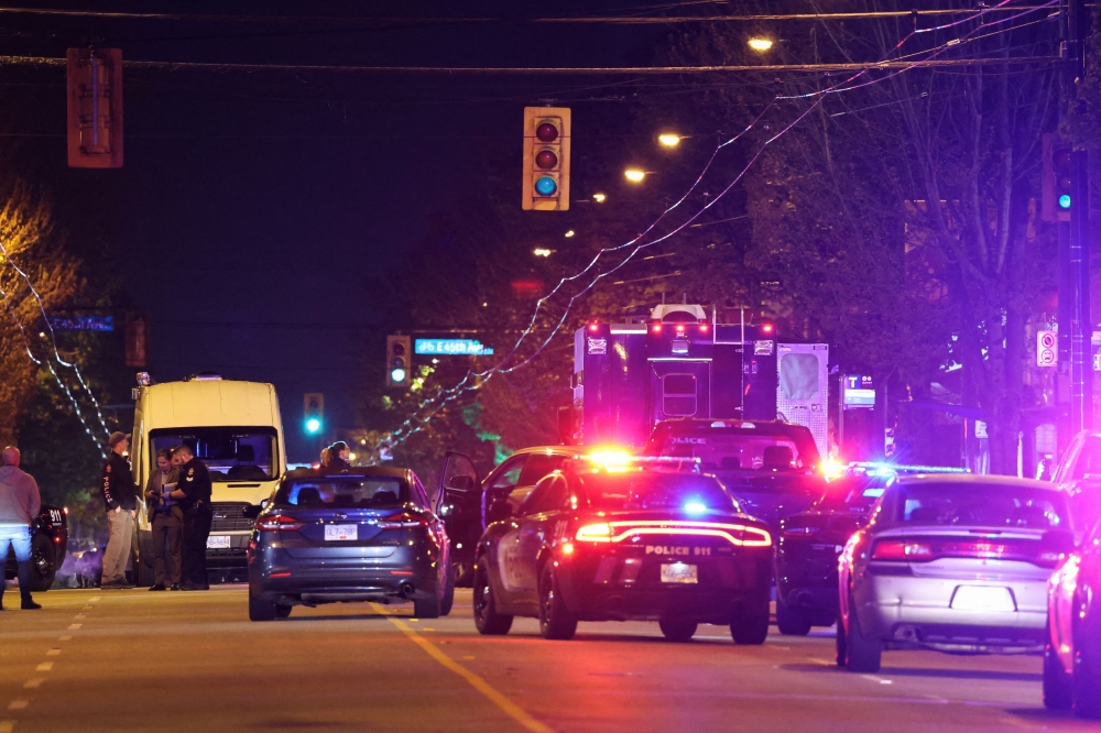 273700 Police officers work at the scene, after a vehicle drove into a crowd at the Lapu Lapu day block party, in which police say multiple people were killed and injured, in Vancouver April 26, 2025. — Reuters pic