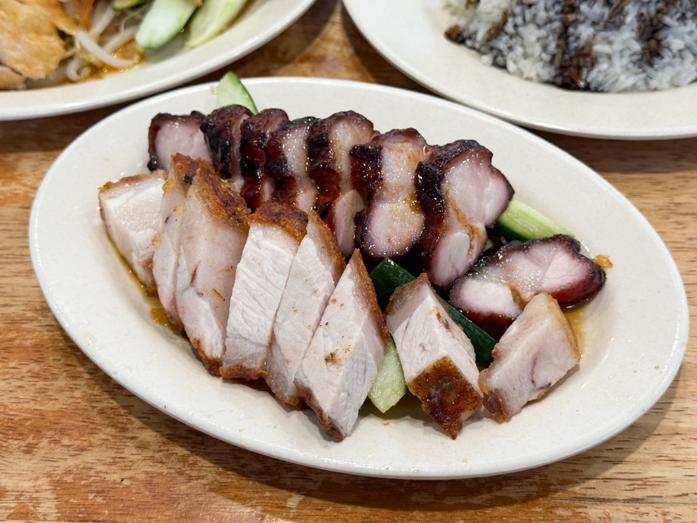 273753 'Char siu' and roast pork can also be ordered to complement your meal here. — Picture by Lee Khang Yi