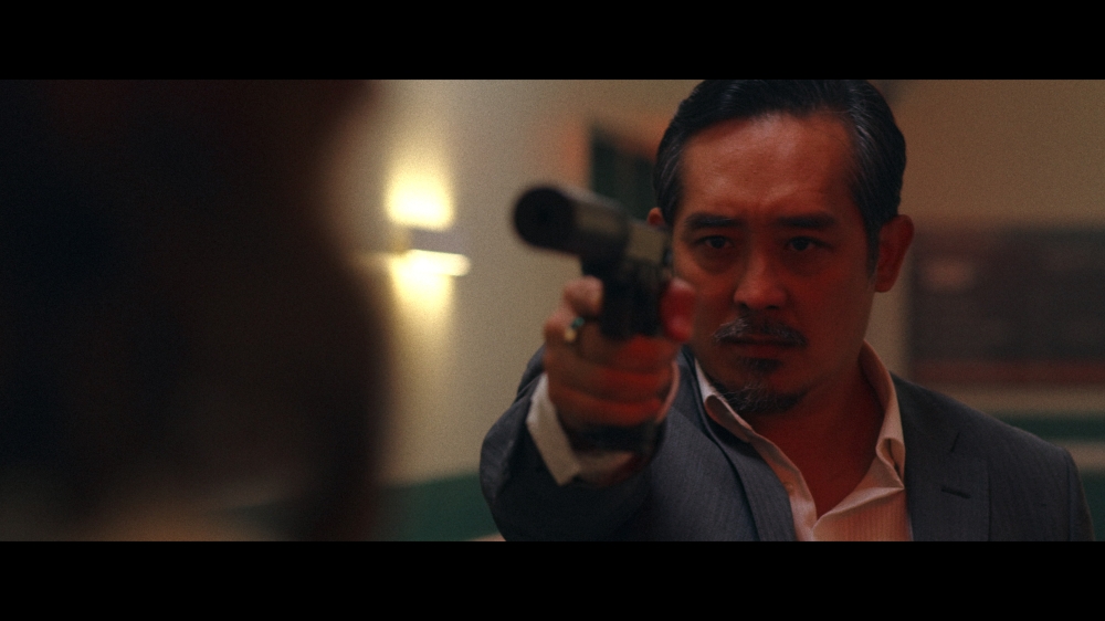 274253 Singapore-born Sunny Pang helms the role of Ching, a Triad member loyal to Mother. — Picture courtesy of Netflix