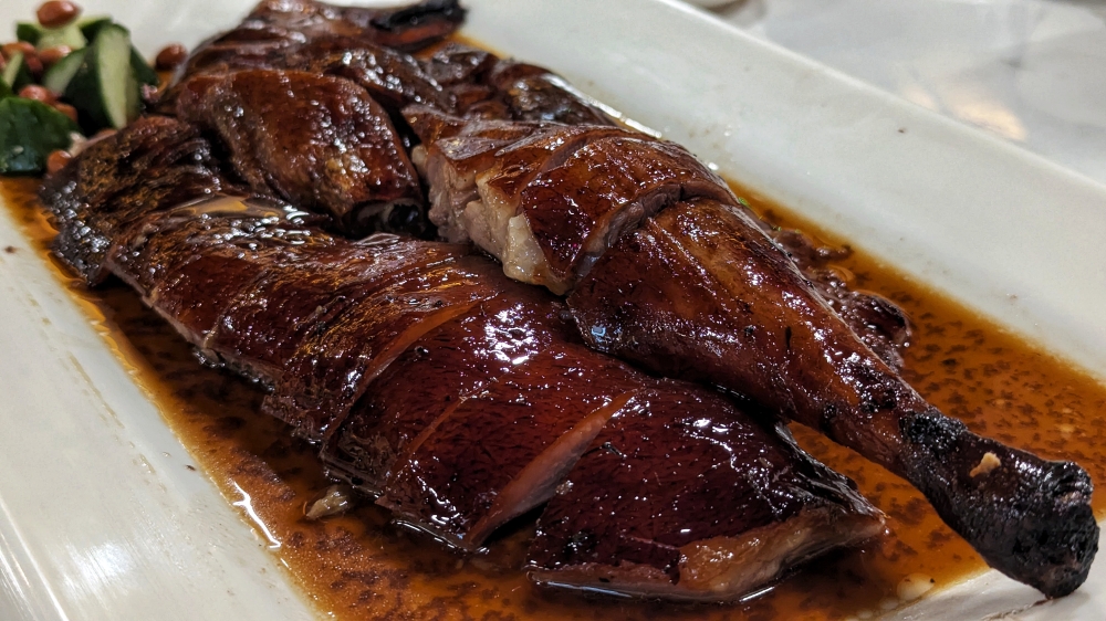274333 The sheen afforded by the goose fat allows the skin to glisten under the light.