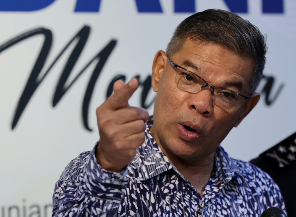 275403 Datuk Seri Saifuddin Nasution Ismail speaks at a press conference in Putrajaya on August 22, 2024. — Bernama pic