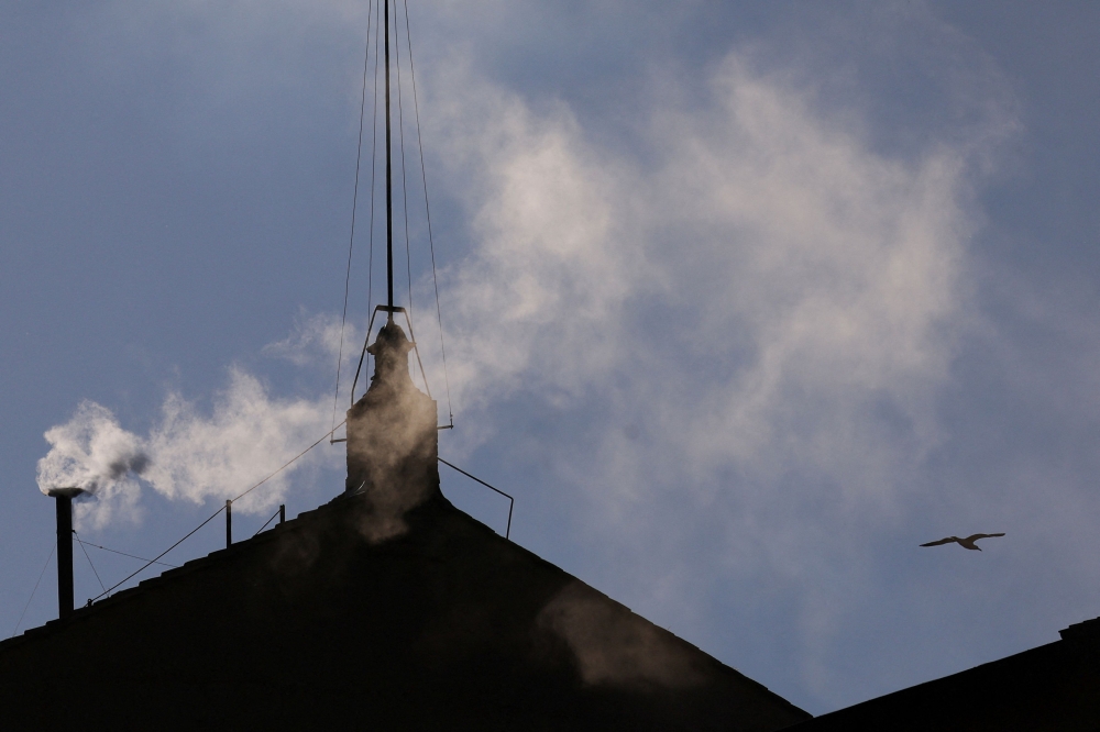 275845 White smoke rises from the chimney on the Sistine Chapel, indicating that a new pope has been elected at the Vatican, May 8, 2025. — Reuters pic