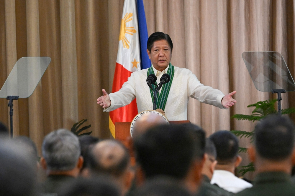 276015 Philippines' President Ferdinand Marcos Jr. gestures to army officers as he delivers a speech during the 128th founding anniversary of the Philippine army at its headquarters in Manila March 22, 2025. — AFP pic
