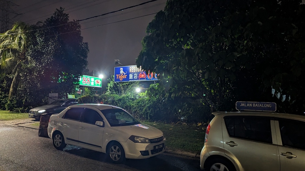 276239 The restaurant is pretty hidden from view from the road, though the cars going in and out are hard to miss. — Picture by Ethan Lau
