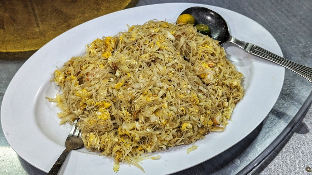 276245 The signature fried ‘mee hoon’ looks plain, but is anything but. — Picture by Ethan Lau