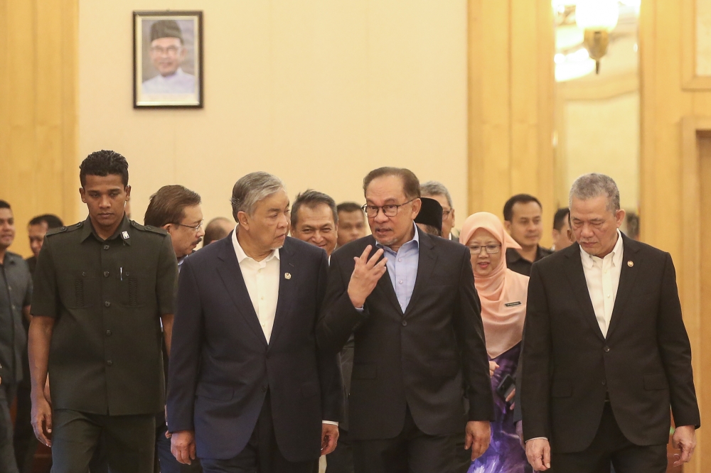 276443-1 Collective responsibility means decisions made by the Cabinet are binding on all members of the government. — Picture by Yusof Mat Isa