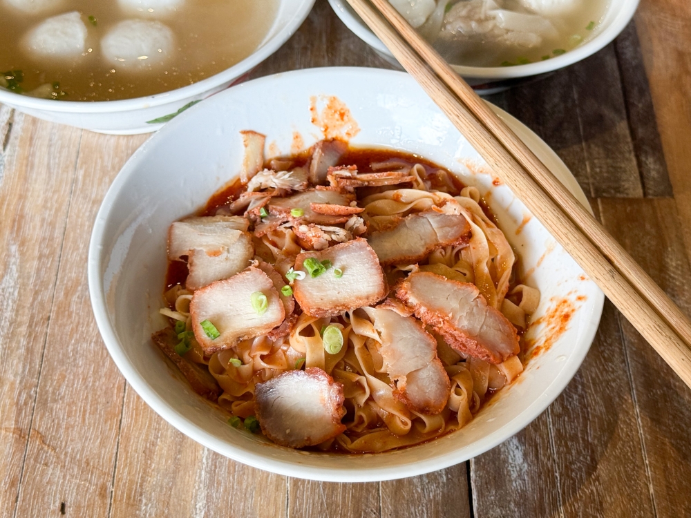 277163 If you picked the red sauce, you get your choice of noodles covered with ‘char siu’. — Picture by Lee Khang Yi