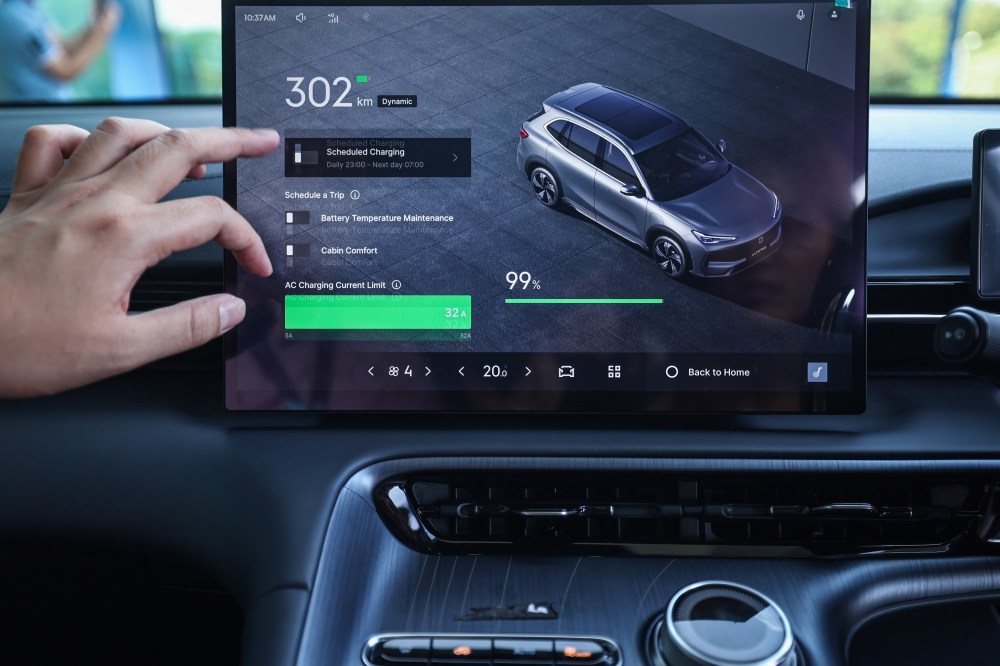 277378 The Proton e.MAS 7 comes with technology that can tell you how much power and kilowatts, as well as how far the vehicle can still go – whether it can reach the destination or needs charging. — Bernama pic