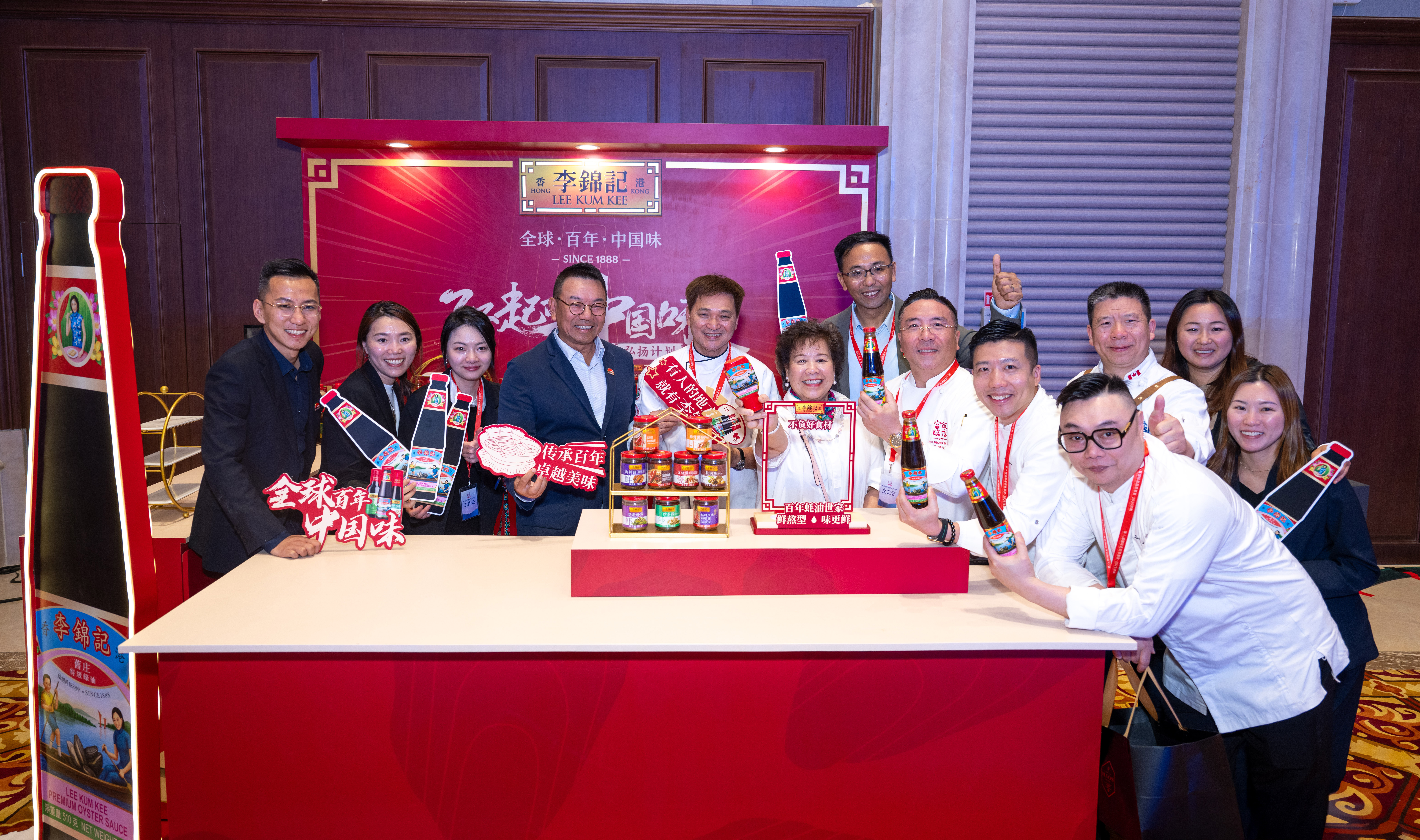 623590-dsc_8357_2_1_-jpg-1 Master chefs from around the world at the Lee Kum Kee booth.